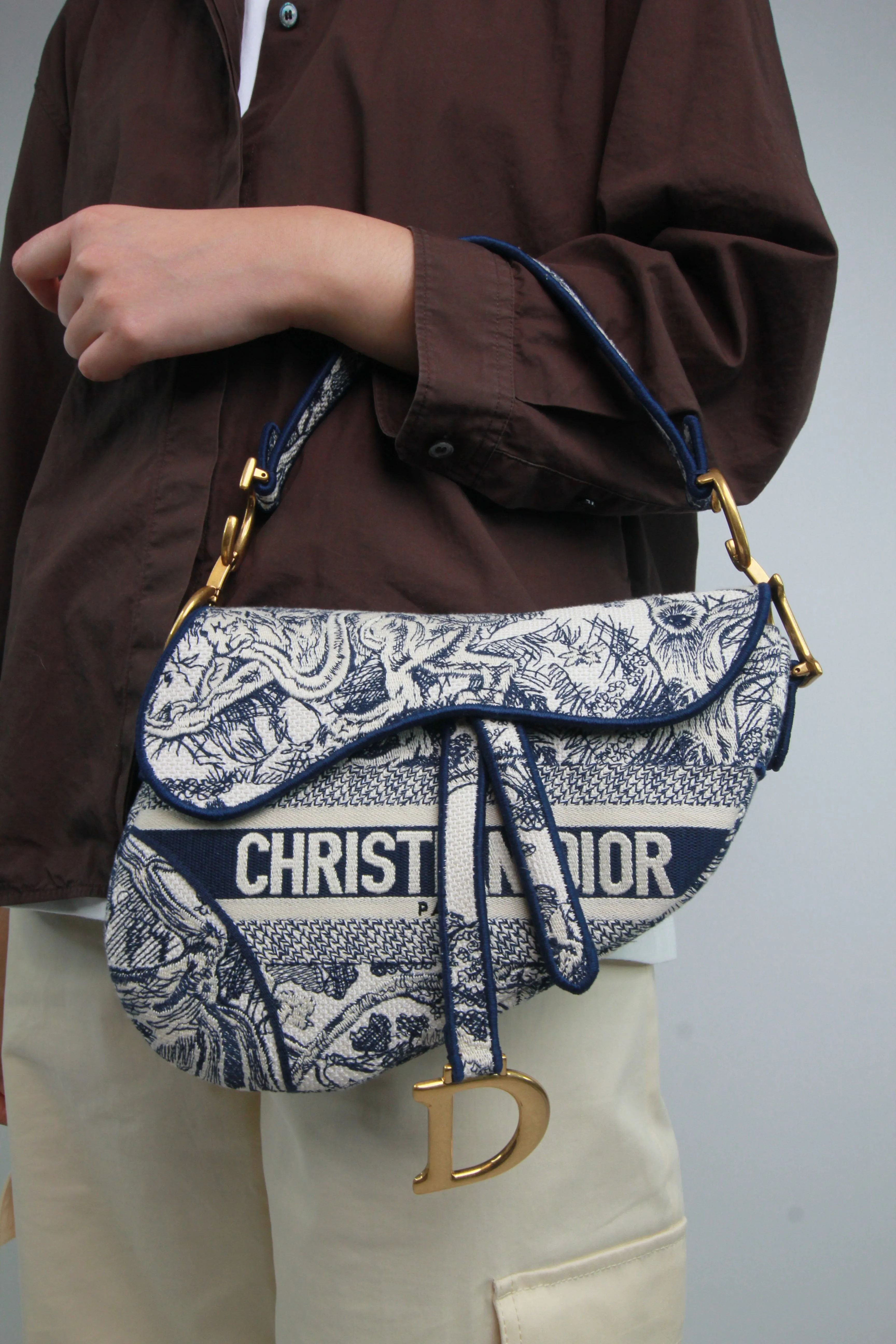 Blue and cream 2021 Around the World embroidered Saddle bag