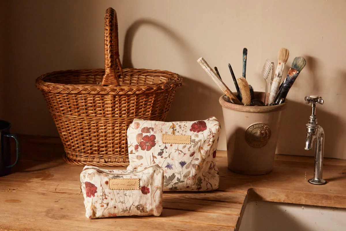 Nola Pressed Floral Print Wash Bag In Cream